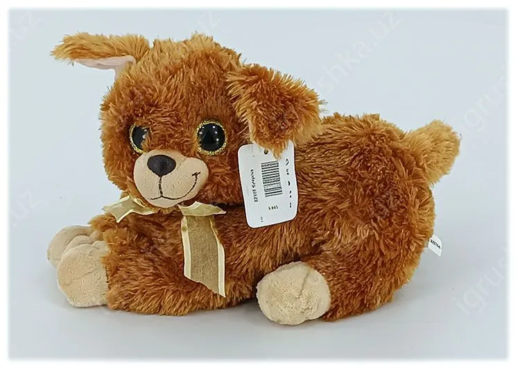 картинка Мягкая игрушка Щенок 15 см, лежачая собачка с золотым бантом от магазина igrushka.uz