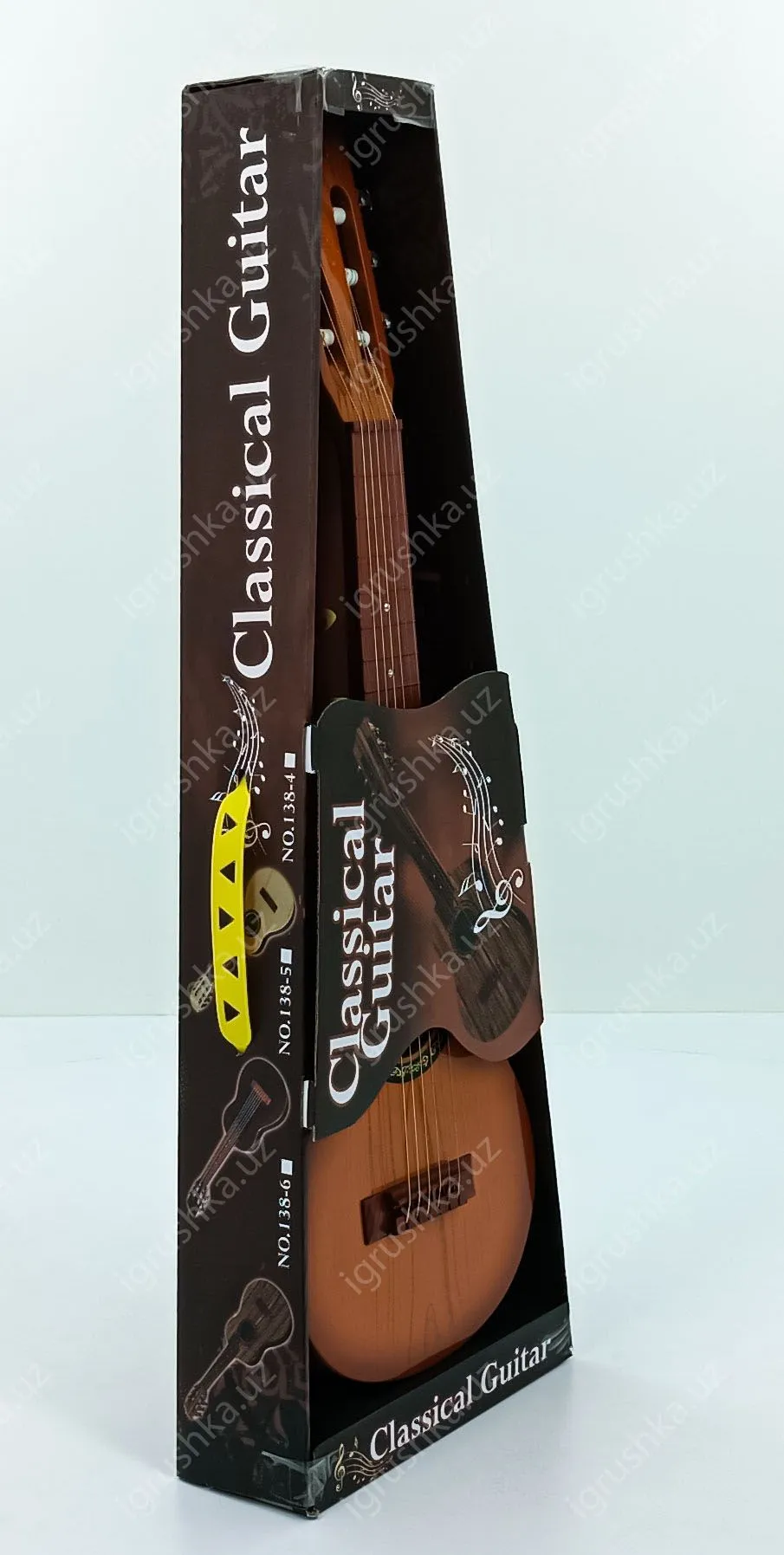 картинка Музыкальный инструмент Гитара пластиковая 67см от магазина igrushka.uz