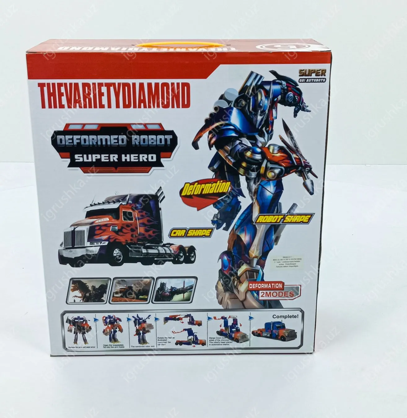 картинка Игрушка робот Deformation большой Робот Трансформер для мальчика + оружие (Оптимус прайм) от магазина igrushka.uz