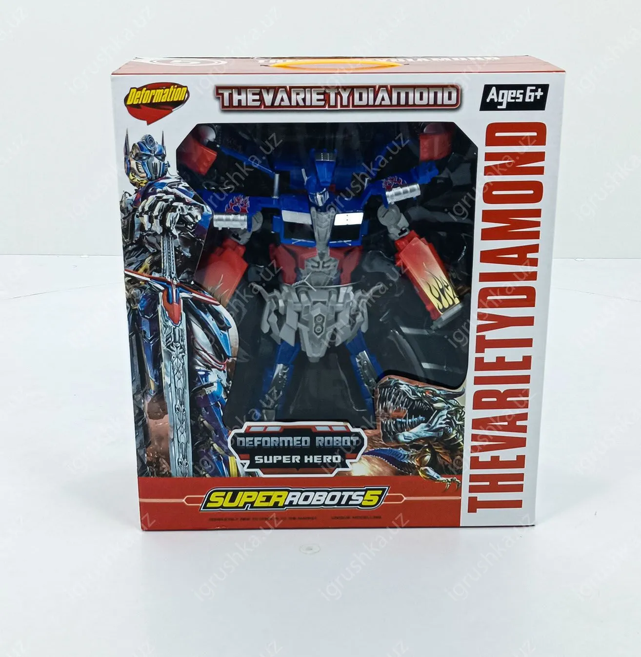 картинка Игрушка робот Deformation большой Робот Трансформер для мальчика + оружие (Оптимус прайм) от магазина igrushka.uz